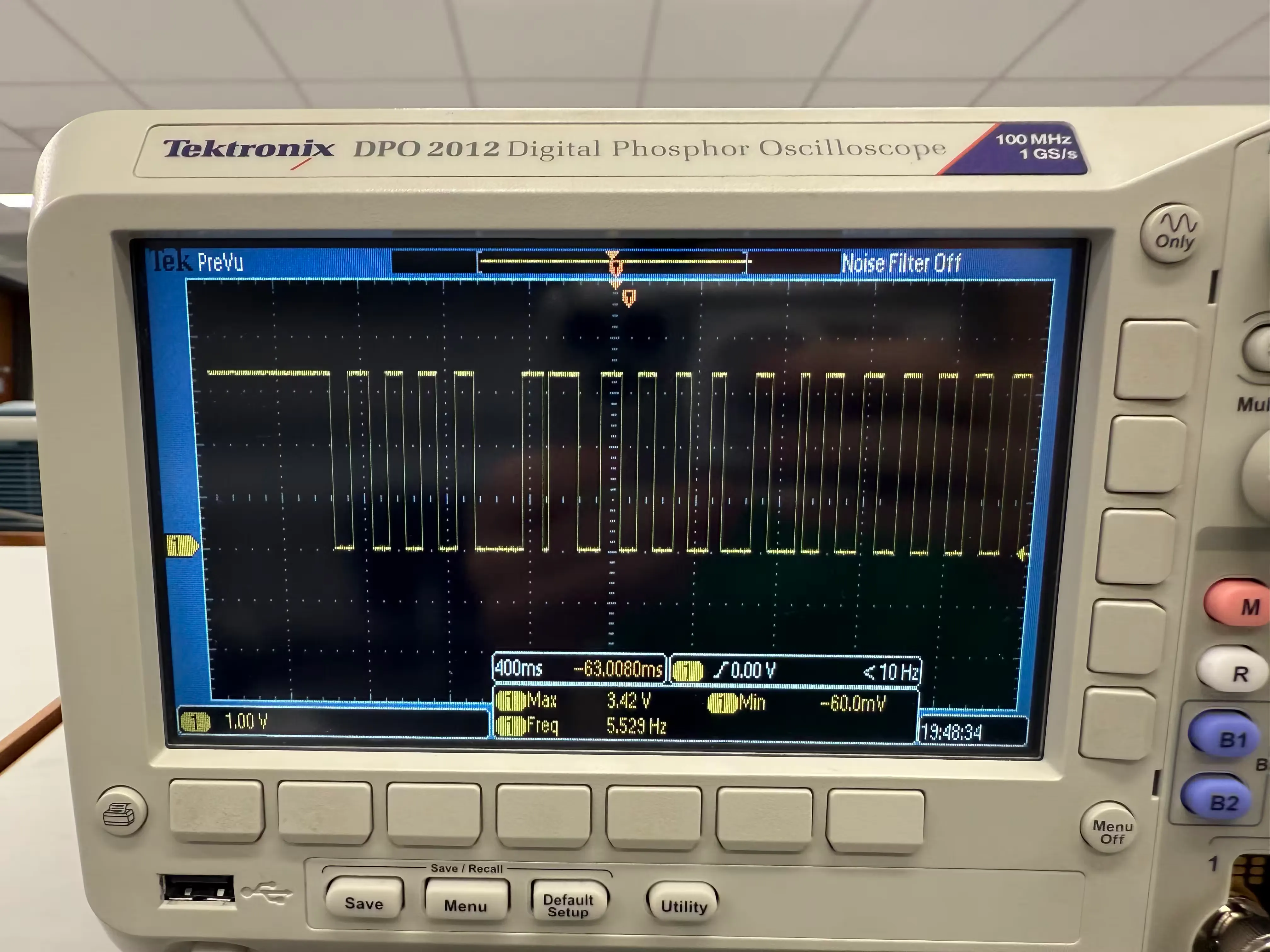 Picture of an oscilloscope with a square-like
waveform.